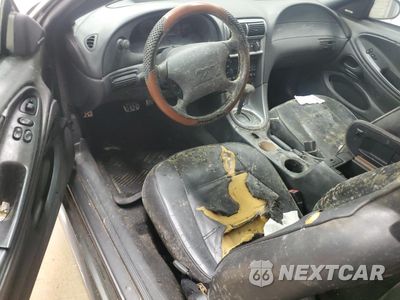 Zdjęcie 8 z 12 samochodu: 2004 FORD MUSTANG VIN:1FAFP40604F189503 - miniatura