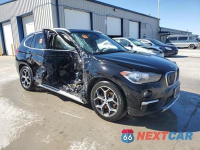 Czwarte zdjęcie samochodu z boku: 2018 BMW X1 XDRIVE28I VIN:WBXHT3C34J5K32030 - miniatura