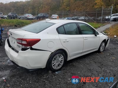 Trzecie zdjęcie samochodu z tyłu: 2017 SUBARU IMPREZA PREMIUM PLUS VIN:4S3GKAD67H3616155 - miniatura