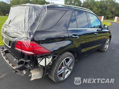 Czwarte zdjęcie samochodu z boku: 2018 MERCEDES-BENZ GLE 400 4MATIC VIN:4JGDA5GBXJB003086 - miniatura
