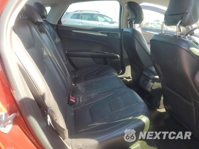 Zdjęcie 10 z 12 samochodu: 2014 FORD FUSION TITANIUM PHEV VIN:3FA6P0SUXER256701 - miniatura