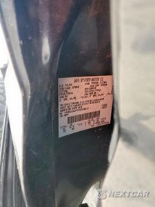 Zdjęcie 13 z 13 samochodu: 2005 FORD EXCURSION LIMITED VIN:1FMSU43P15ED38431 - miniatura