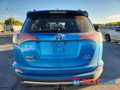 Zdjęcie 6 z 13 samochodu: 2018 TOYOTA RAV4 HV VIN:JTMRJREV2JD187989 - miniatura