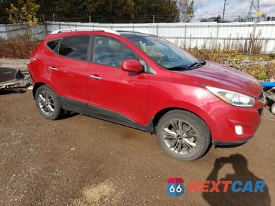 Czwarte zdjęcie samochodu z boku: 2015 HYUNDAI TUCSON LIMITED VIN:KM8JUCAG3FU084060 - miniatura