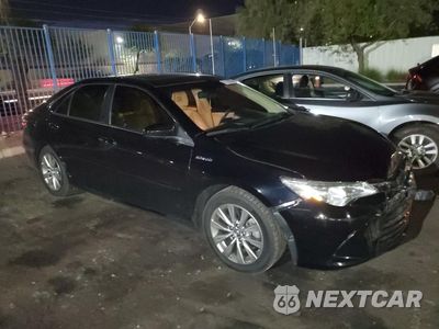 Czwarte zdjęcie samochodu z boku: 2015 TOYOTA CAMRY HYBRID VIN:4T1BD1FKXFU175493 - miniatura