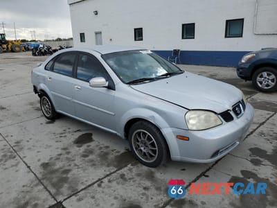 Czwarte zdjęcie samochodu z boku: 2004 SUZUKI FORENZA S VIN:KL5JD52Z74K982191 - miniatura