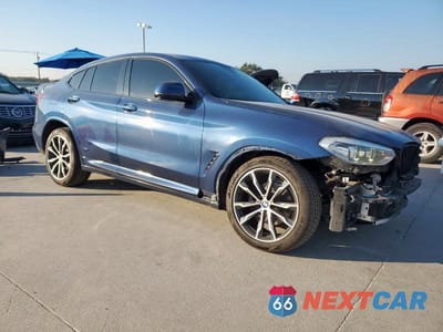 Czwarte zdjęcie samochodu z boku: 2020 BMW X4 XDRIVE30I VIN:5UX2V1C03LLE67610 - miniatura