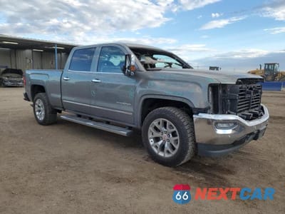 Czwarte zdjęcie samochodu z boku: 2017 GMC SIERRA K1500 SLT VIN:3GTU2NEJ2HG322561 - miniatura