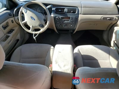Zdjęcie 8 z 12 samochodu: 2000 FORD TAURUS SES VIN:1FAFP5523YG208699 - miniatura