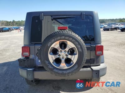 Zdjęcie 6 z 11 samochodu: 2016 JEEP WRANGLER UNLIMITED SAHARA VIN:1C4BJWEG3GL268452 - miniatura