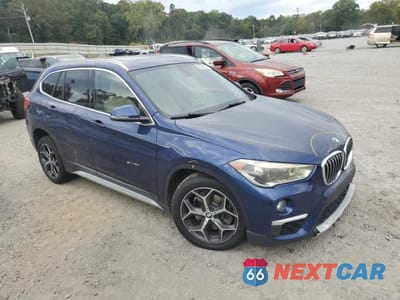 Czwarte zdjęcie samochodu z boku: 2017 BMW X1 SDRIVE28I VIN:WBXHU7C30H5H32610 - miniatura