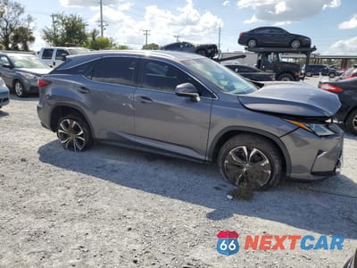 Czwarte zdjęcie samochodu z boku: 2017 LEXUS RX 350 BASE VIN:2T2ZZMCA0HC086383 - miniatura