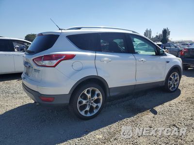 Trzecie zdjęcie samochodu z tyłu: 2016 FORD ESCAPE TITANIUM VIN:1FMCU0J94GUC59684 - miniatura