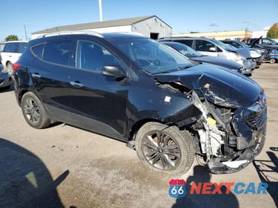 Czwarte zdjęcie samochodu z boku: 2015 HYUNDAI TUCSON LIMITED VIN:KM8JUCAG3FU078808 - miniatura