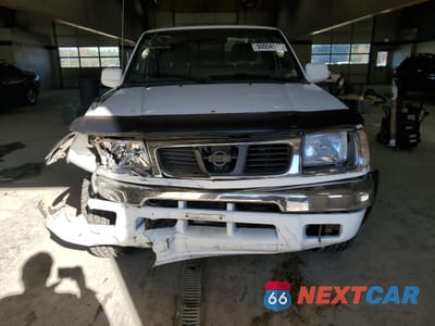 Piąte zdjęcie samochodu w środku: 1999 NISSAN FRONTIER KING CAB XE VIN:1N6ED26Y4XC345475 - miniatura