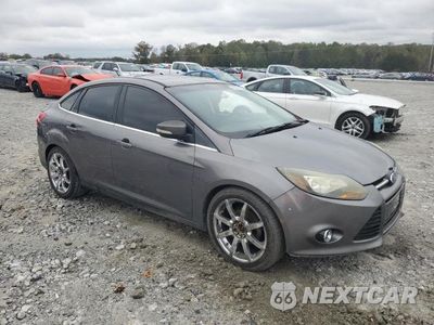 Czwarte zdjęcie samochodu z boku: 2012 FORD FOCUS TITANIUM VIN:1FAHP3J27CL135016 - miniatura