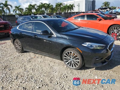 Czwarte zdjęcie samochodu z boku: 2021 BMW 228I VIN:WBA53AK09M7H51692 - miniatura