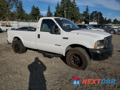 Czwarte zdjęcie samochodu z boku: 1999 FORD F250 SUPER DUTY VIN:1FTNF20F5XEE97600 - miniatura