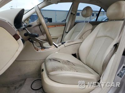 Zdjęcie 7 z 12 samochodu: 2003 MERZ E 320 VIN:WDBUF65J23A310409 - miniatura