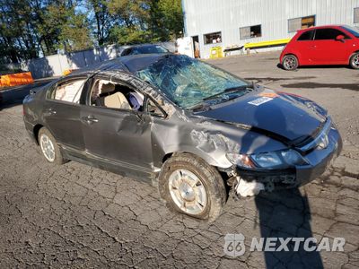 Czwarte zdjęcie samochodu z boku: 2006 HONDA CIVIC HYBRID VIN:JHMFA36276S022557 - miniatura