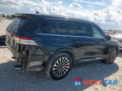 Trzecie zdjęcie samochodu z tyłu: 2022 LINCOLN AVIATOR RESERVE VIN:5LM5J7WCXNGL09964 - miniatura