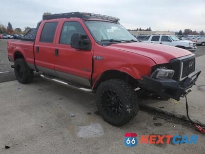 Czwarte zdjęcie samochodu z boku: 2001 FORD F250 SUPER DUTY VIN:1FTNW21F01EA70153 - miniatura