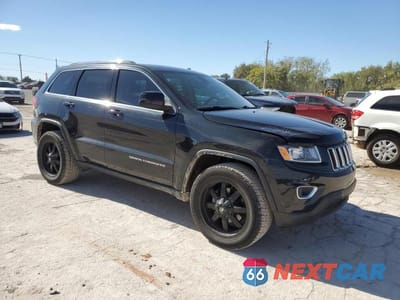 Czwarte zdjęcie samochodu z boku: 2014 JEEP GRAND CHEROKEE LAREDO VIN:1C4RJFAG7EC164337 - miniatura