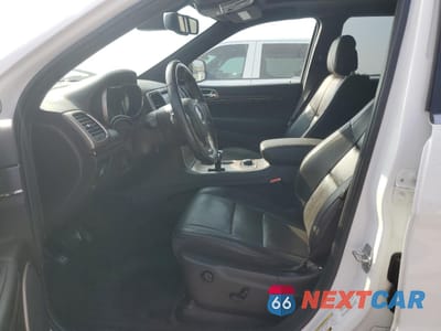 Zdjęcie 7 z 16 samochodu: 2014 JEEP GRAND CHEROKEE SUMMIT VIN:1C4RJFJT8EC346884 - miniatura