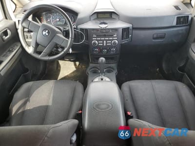 Zdjęcie 8 z 13 samochodu: 2011 MITSUBISHI ENDEAVOR LS VIN:4A4JN2AS7BE036025 - miniatura