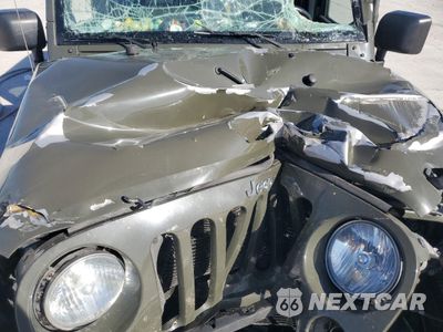 Zdjęcie 11 z 12 samochodu: 2015 JEEP WRANGLER UNLIMITED SPORT VIN:1C4BJWDGXFL760931 - miniatura