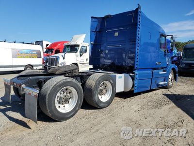 Czwarte zdjęcie samochodu z boku: 2017 VOLVO VNL SEMI TRUCK VIN:4V4NC9EG6HN976939 - miniatura