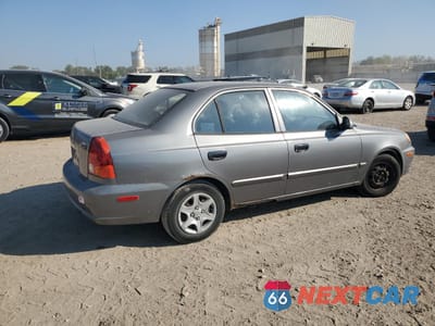 Trzecie zdjęcie samochodu z tyłu: 2004 HYUNDAI ACCENT GL VIN:KMHCG45C64U499903 - miniatura
