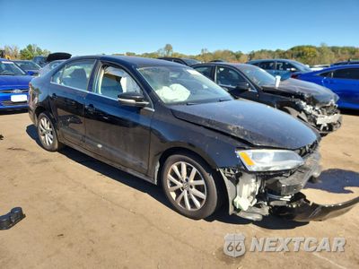 Czwarte zdjęcie samochodu z boku: 2014 VOLKSWAGEN JETTA SE VIN:3VWD17AJ2EM428569 - miniatura