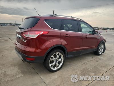 Trzecie zdjęcie samochodu z tyłu: 2015 FORD ESCAPE TITANIUM VIN:1FMCU0J92FUC04052 - miniatura