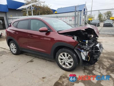 Czwarte zdjęcie samochodu z boku: 2019 HYUNDAI TUCSON LIMITED VIN:KM8J3CA44KU034562 - miniatura