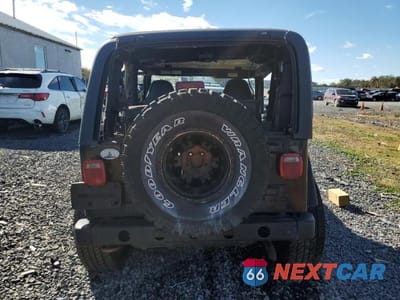 Zdjęcie 6 z 13 samochodu: 2001 JEEP WRANGLER / TJ SPORT VIN:1J4FA49S41P342444 - miniatura