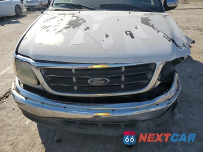 Zdjęcie 11 z 14 samochodu: 2001 FORD F150 SUPERCREW VIN:1FTRW07L31KB53225 - miniatura