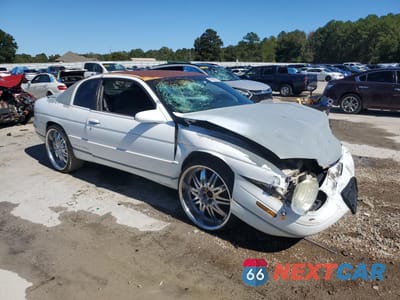 Czwarte zdjęcie samochodu z boku: 1999 CHEVROLET MONTE CARLO LS VIN:2G1WW12M2X9219727 - miniatura