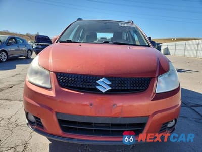 Piąte zdjęcie samochodu w środku: 2011 SUZUKI SX4 VIN:JS2YB5A33B6303699 - miniatura