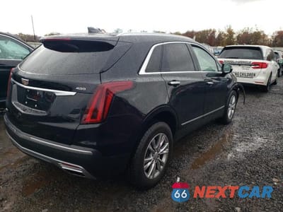Trzecie zdjęcie samochodu z tyłu: 2022 CADILLAC XT5 PREMIUM LUXURY VIN:1GYKNDRS6NZ105208 - miniatura