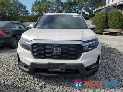 Piąte zdjęcie samochodu w środku: 2024 HONDA PASSPORT EXL VIN:5FNYF8H51RB019803 - miniatura