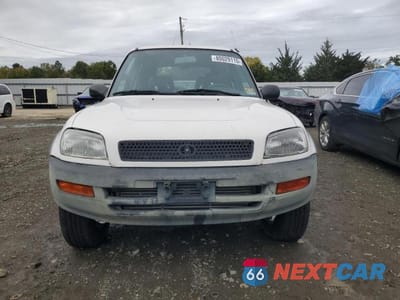 Piąte zdjęcie samochodu w środku: 1997 TOYOTA RAV4 VIN:JT3HP10V0V0125270 - miniatura