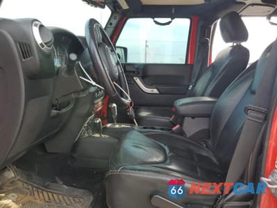 Zdjęcie 7 z 11 samochodu: 2015 JEEP WRANGLER UNLIMITED SAHARA VIN:1C4BJWEG7FL685877 - miniatura