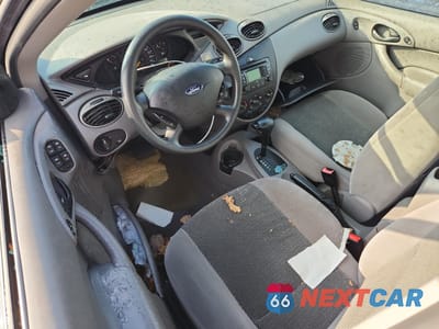 Zdjęcie 8 z 12 samochodu: 2003 FORD FOCUS SE COMFORT VIN:1FAFP34393W284490 - miniatura