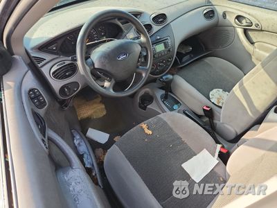 Zdjęcie 8 z 12 samochodu: 2003 FORD FOCUS SE COMFORT VIN:1FAFP34393W284490 - miniatura