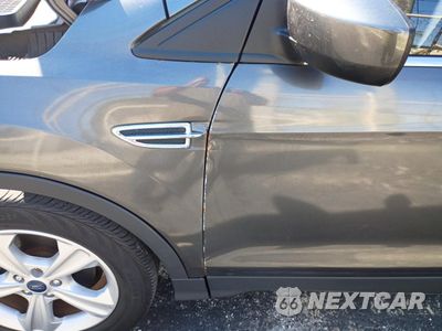 Zdjęcie 14 z 15 samochodu: 2016 FORD ESCAPE SE VIN:1FMCU0GX3GUC08862 - miniatura