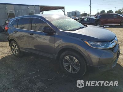 Czwarte zdjęcie samochodu z boku: 2017 HONDA CR-V LX VIN:2HKRW5H37HH402579 - miniatura