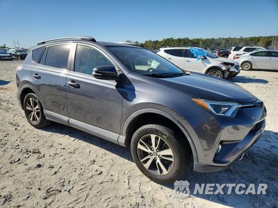 Czwarte zdjęcie samochodu z boku: 2017 TOYOTA RAV4 XLE VIN:JTMWFREV5HD101170 - miniatura