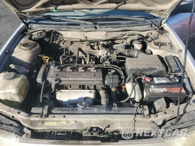 Zdjęcie 11 z 12 samochodu: 1997 TOYOTA COROLLA BASE VIN:1NXBA02E5VZ658455 - miniatura