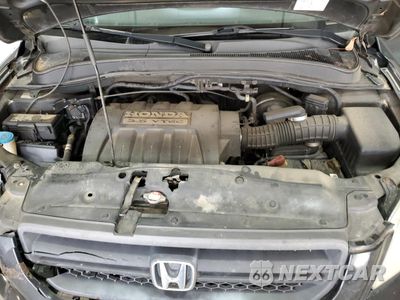 Zdjęcie 12 z 15 samochodu: 2005 HONDA PILOT EXL VIN:2HKYF18785H548301 - miniatura